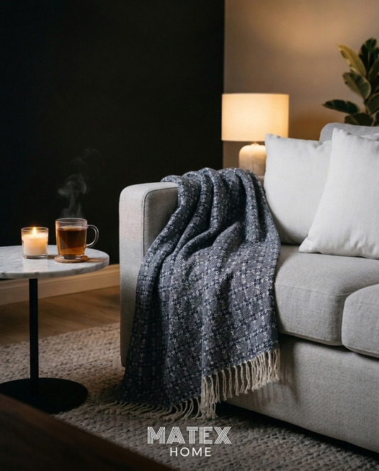 Charcoal Navy Trellis Throw draped on a sofa